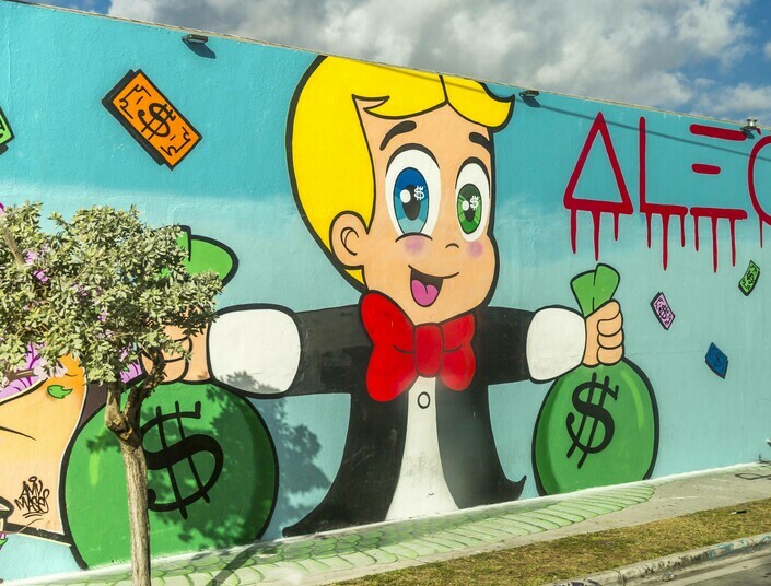 Graffiti-Männchen mit Dollar-Geldsäcken im Wynwood Art District in Miami, Florida